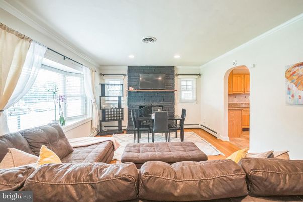 Dining room, Fireplace, Interior, Living room, Recessed Lighting, Wood Texture Flooring