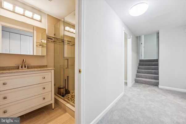 Bathroom, Glass Shower, Interior, Walk-in Closets, Wood Texture Flooring