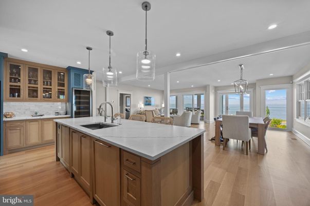 Dining room, Interior, Kitchen, Living room, Pendant Lights, Recessed Lighting, Stainless Steel Appliances, Wood Texture Flooring