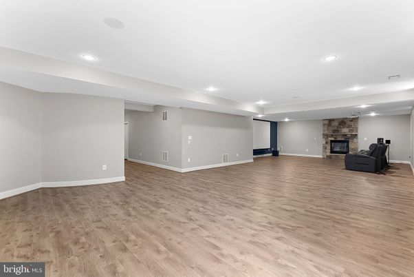 Empty room, Fireplace, Interior, Recessed Lighting, Wood Texture Flooring
