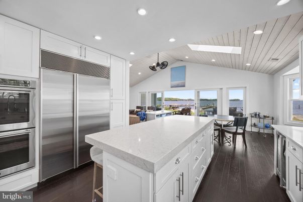 Dining room, Interior, Kitchen, Recessed Lighting, Stainless Steel Appliances, Wood Texture Flooring