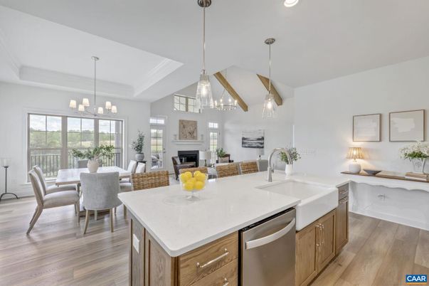 Dining room, Fireplace, Interior, Kitchen, Living room, Pendant Lights, Recessed Lighting, Stainless Steel Appliances, Wood Texture Flooring