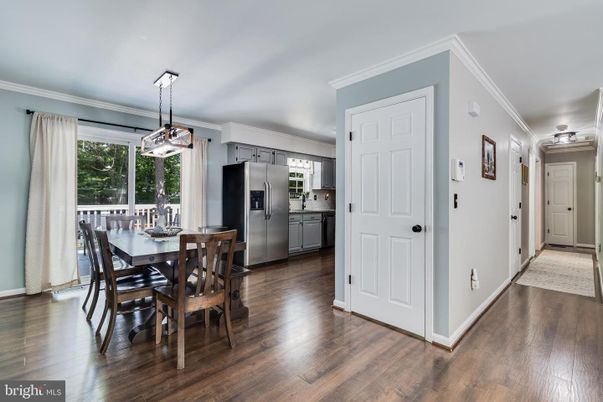 Dining room, Interior, Kitchen, Pendant Lights, Stainless Steel Appliances, Wood Texture Flooring