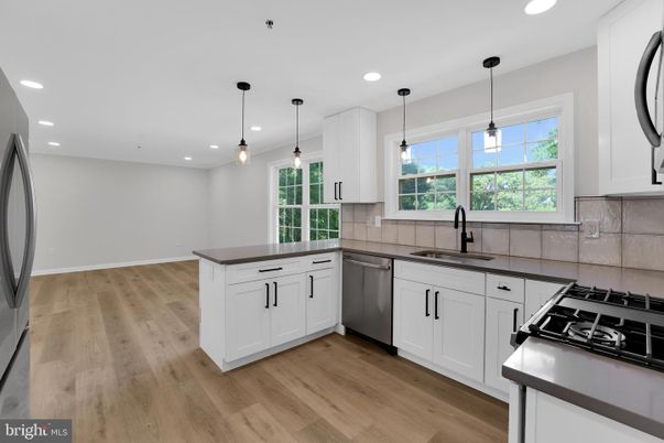 Interior, Kitchen, Pendant Lights, Recessed Lighting, Stainless Steel Appliances, Wood Texture Flooring