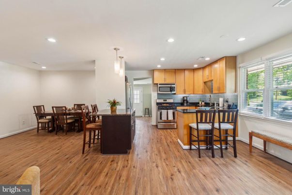 Dining room, Interior, Kitchen, Pendant Lights, Recessed Lighting, Stainless Steel Appliances, Wood Texture Flooring
