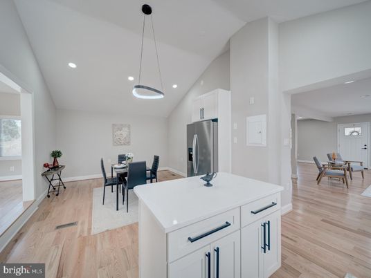 Dining room, Interior, Kitchen, Pendant Lights, Recessed Lighting, Stainless Steel Appliances, Wood Texture Flooring