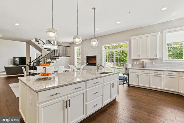 Dining room, Fireplace, Interior, Kitchen, Living room, Pendant Lights, Recessed Lighting, Wood Texture Flooring