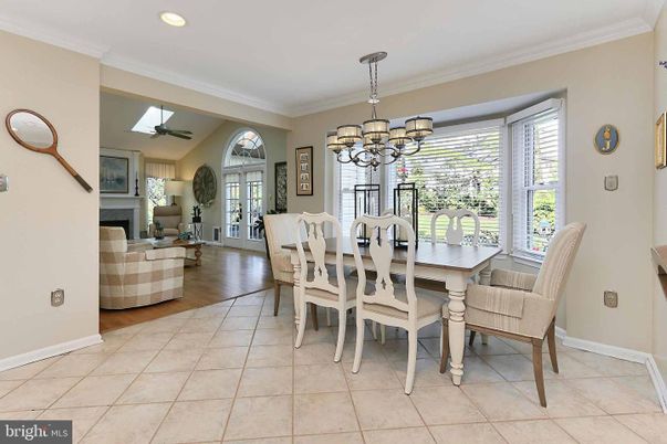 Chandelier, Dining room, Fireplace, Interior, Living room, Recessed Lighting, Wood Texture Flooring