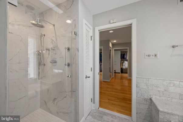 Bathroom, Glass Shower, Interior, Marble, Marble Walls, Recessed Lighting, Wood Texture Flooring