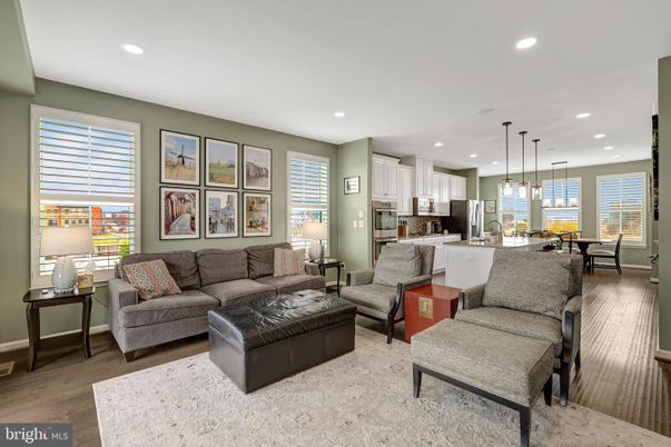 Dining room, Interior, Kitchen, Living room, Pendant Lights, Recessed Lighting, Stainless Steel Appliances, Wood Texture Flooring