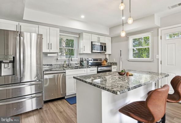 Interior, Kitchen, Pendant Lights, Recessed Lighting, Stainless Steel Appliances, Wood Texture Flooring
