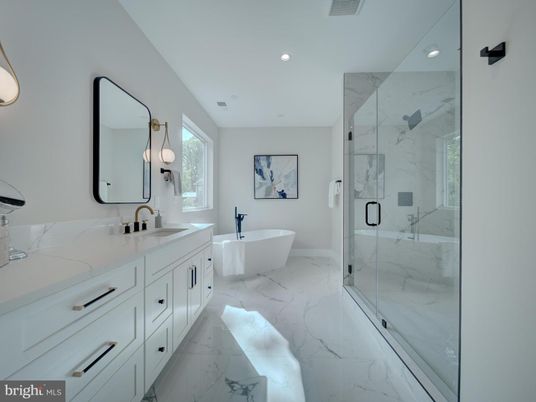Bathroom, Dual Sink Vanities, Free Standing Baths, Glass Shower, Interior, Marble, Marble Walls, Recessed Lighting