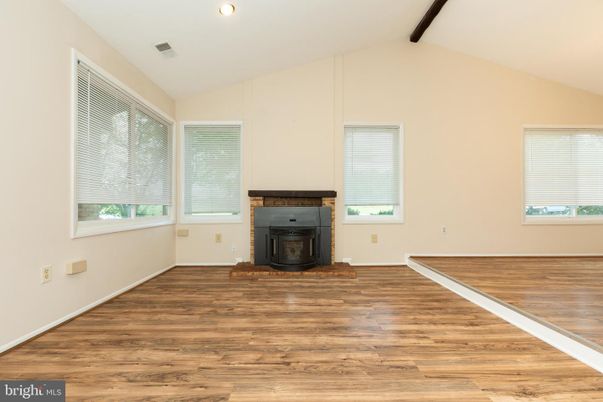 Empty room, Fireplace, Interior, Recessed Lighting, Wood Texture Flooring