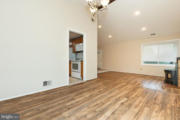 Chandelier, Empty room, Interior, Recessed Lighting, Wood Texture Flooring
