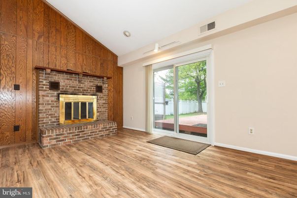 Empty room, Fireplace, Interior, Stone Walls, Wood Texture Flooring
