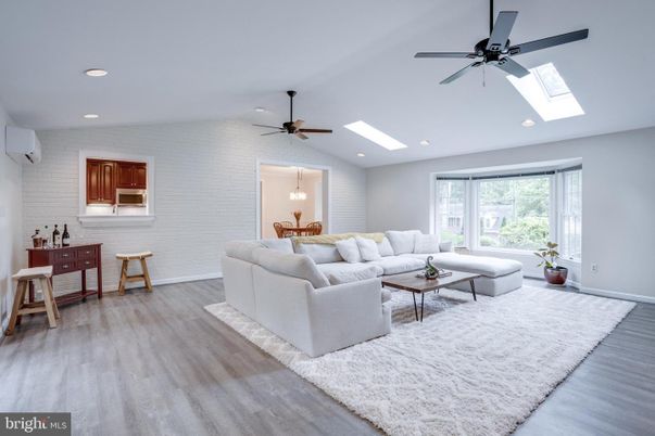 Dining room, Interior, Living room, Pendant Lights, Recessed Lighting, Stone Walls, Wood Texture Flooring