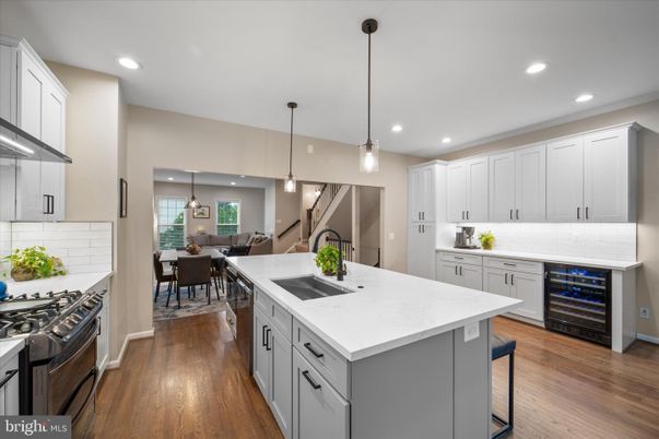 Dining room, Interior, Kitchen, Pendant Lights, Recessed Lighting, Stainless Steel Appliances, Wood Texture Flooring