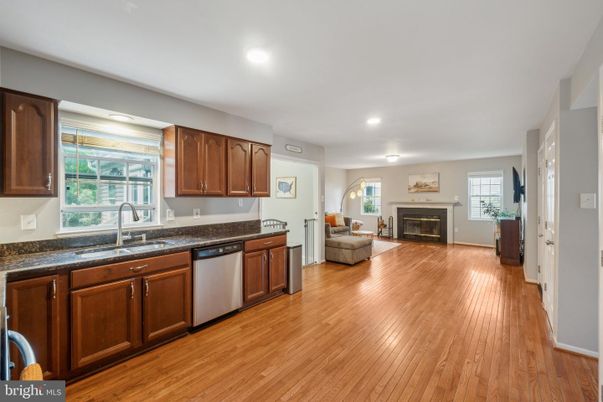 Fireplace, Interior, Kitchen, Living room, Recessed Lighting, Wood Texture Flooring