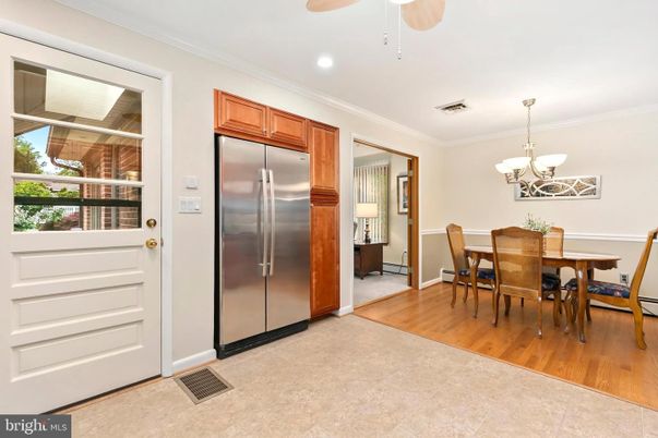 Chandelier, Dining room, Interior, Kitchen, Recessed Lighting, Stainless Steel Appliances, Wood Texture Flooring