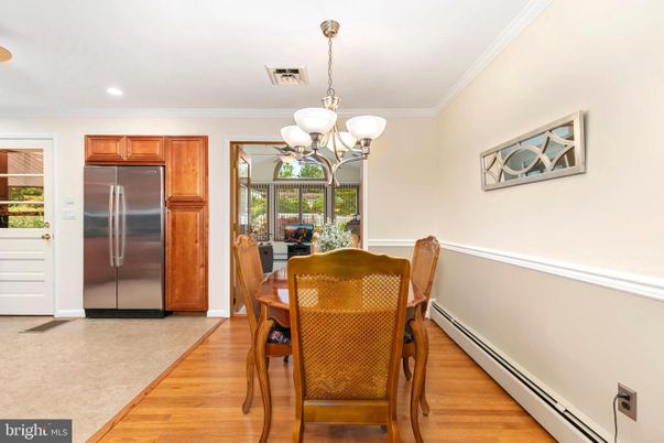 Chandelier, Dining room, Interior, Kitchen, Recessed Lighting, Stainless Steel Appliances, Wood Texture Flooring