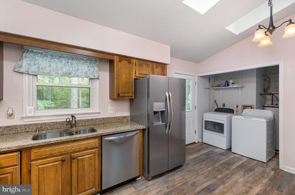 Interior, Kitchen, Pendant Lights, Washer, Wood Texture Flooring