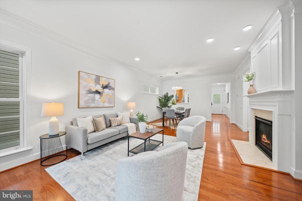 Dining room, Fireplace, Interior, Living room, Pendant Lights, Recessed Lighting, Wood Texture Flooring