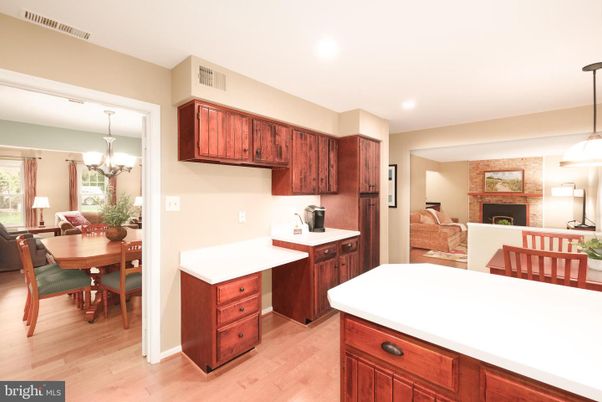 Chandelier, Dining room, Fireplace, Interior, Kitchen, Living room, Pendant Lights, Recessed Lighting, Wood Texture Flooring