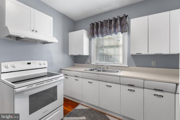 Interior, Kitchen, Tile Countertops, Wood Texture Flooring