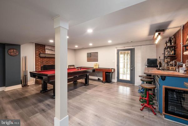 Billiard Table, Fireplace, Game Room, Interior, Recessed Lighting, Stone Walls, Wood Texture Flooring