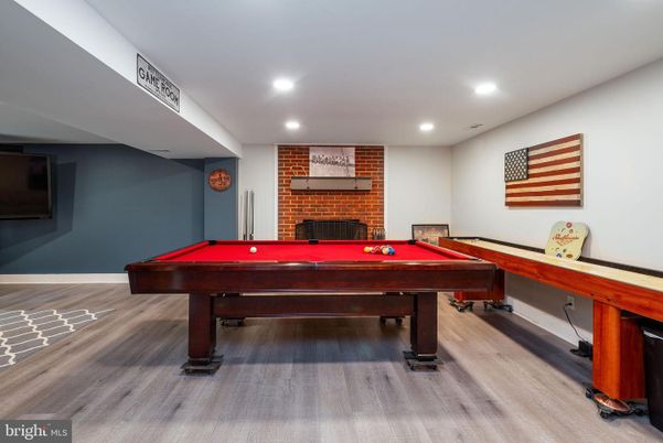Billiard Table, Fireplace, Game Room, Interior, Recessed Lighting, Stone Walls, Wood Texture Flooring