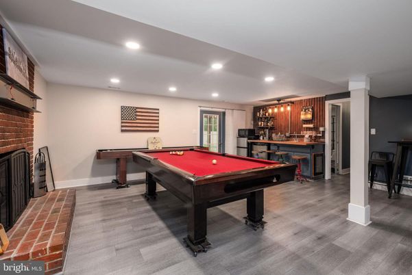Billiard Table, Fireplace, Game Room, Interior, Recessed Lighting, Stone Walls, Wood Texture Flooring