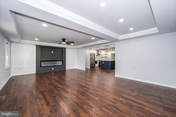 Empty room, Fireplace, Interior, Kitchen, Recessed Lighting, Wood Texture Flooring