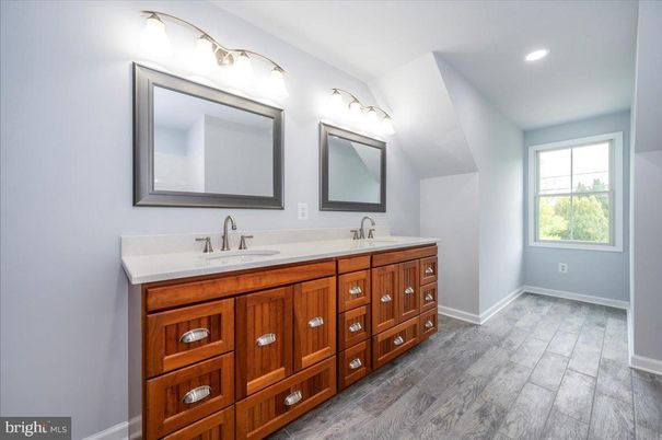 Bathroom, Dual Sink Vanities, Interior, Recessed Lighting, Wood Texture Flooring