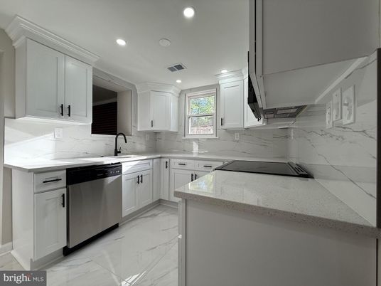 Interior, Kitchen, Marble, Marble Walls, Recessed Lighting, Stainless Steel Appliances