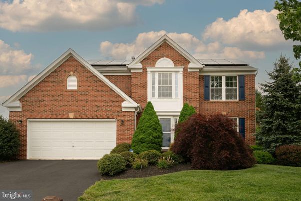 Attached, Exterior, Facade, Brick Facade, Solar Panels, Brick Traditional