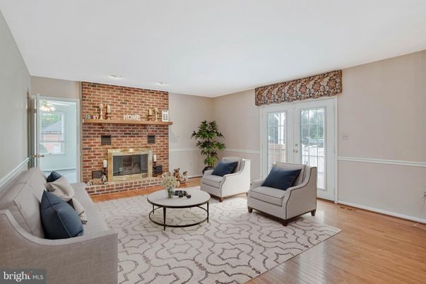 Fireplace, Interior, Living room, Recessed Lighting, Stone Walls, Wood Texture Flooring
