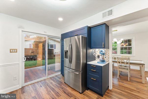 Dining room, Interior, Kitchen, Recessed Lighting, Stainless Steel Appliances, Wood Texture Flooring