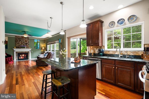 Fireplace, Interior, Kitchen, Pendant Lights, Recessed Lighting, Stone Walls, Wood Texture Flooring