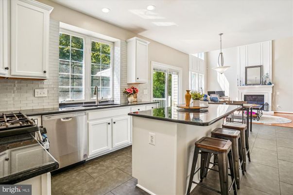 Dining room, Fireplace, Interior, Kitchen, Pendant Lights, Recessed Lighting, Stainless Steel Appliances