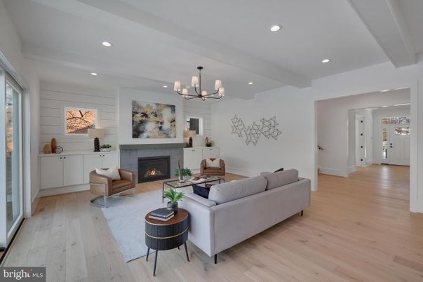 Chandelier, Fireplace, Interior, Living room, Pendant Lights, Recessed Lighting, Wood Texture Flooring