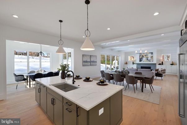 Dining room, Fireplace, Interior, Kitchen, Living room, Pendant Lights, Recessed Lighting, Stainless Steel Appliances, Wood Texture Flooring