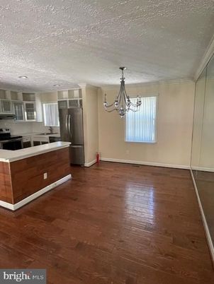 Chandelier, Empty room, Interior, Kitchen, Stainless Steel Appliances, Wood Texture Flooring