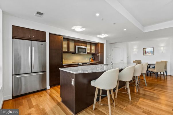 Dining room, Interior, Kitchen, Recessed Lighting, Stainless Steel Appliances, Wood Texture Flooring