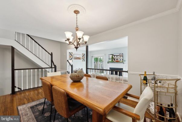 Chandelier, Dining room, Fireplace, Interior, Wood Texture Flooring