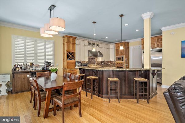 Dining room, Interior, Kitchen, Pendant Lights, Recessed Lighting, Stainless Steel Appliances, Wood Texture Flooring