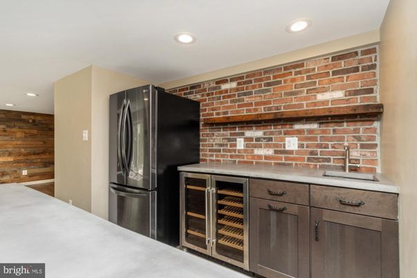 Interior, Kitchen, Recessed Lighting, Stainless Steel Appliances, Stone Walls
