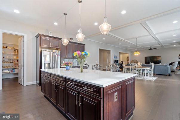 Dining room, Interior, Kitchen, Living room, Pendant Lights, Recessed Lighting, Stainless Steel Appliances, Wood Texture Flooring