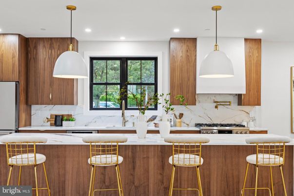 Interior, Kitchen, Marble Walls, Pendant Lights, Recessed Lighting, Stainless Steel Appliances