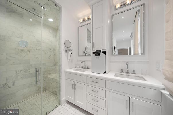 Bathroom, Dual Sink Vanities, Glass Shower, Interior, Marble Walls, Recessed Lighting