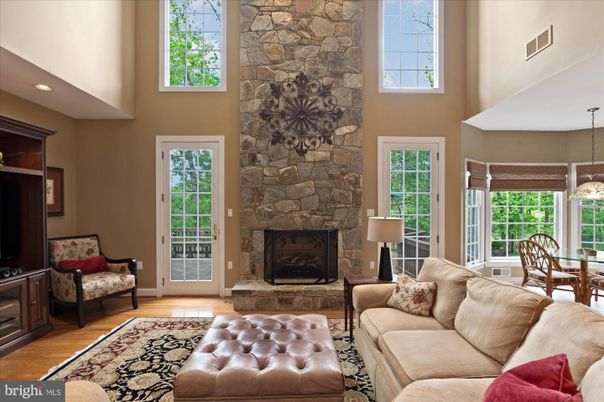Dining room, Fireplace, Interior, Living room, Pendant Lights, Recessed Lighting, Stone Walls, Wood Texture Flooring